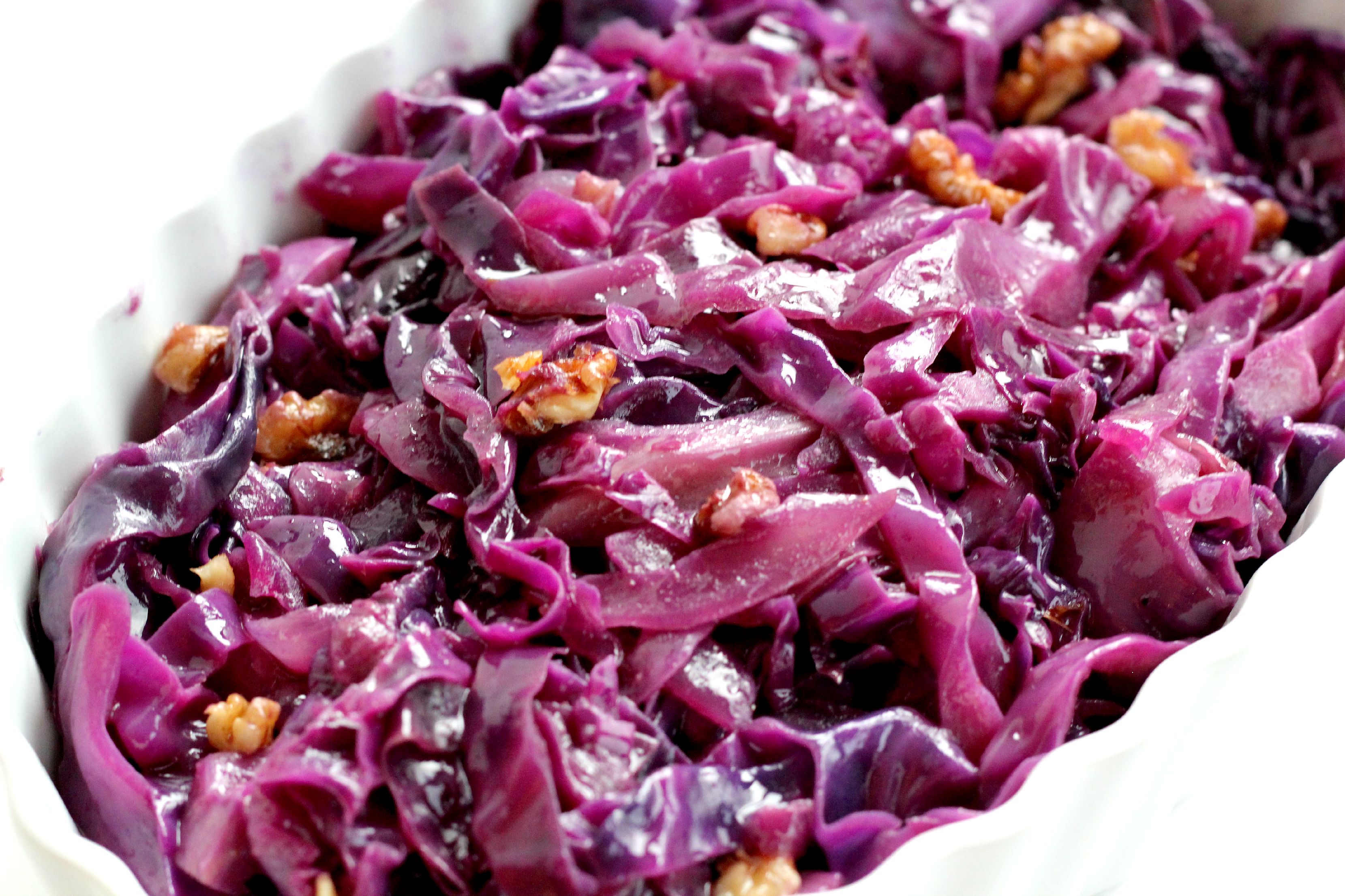 This Braised Red Cabbage with Walnuts has become my FAVORITE side dish. It goes with everything I make and it's Paleo and Vegan! 