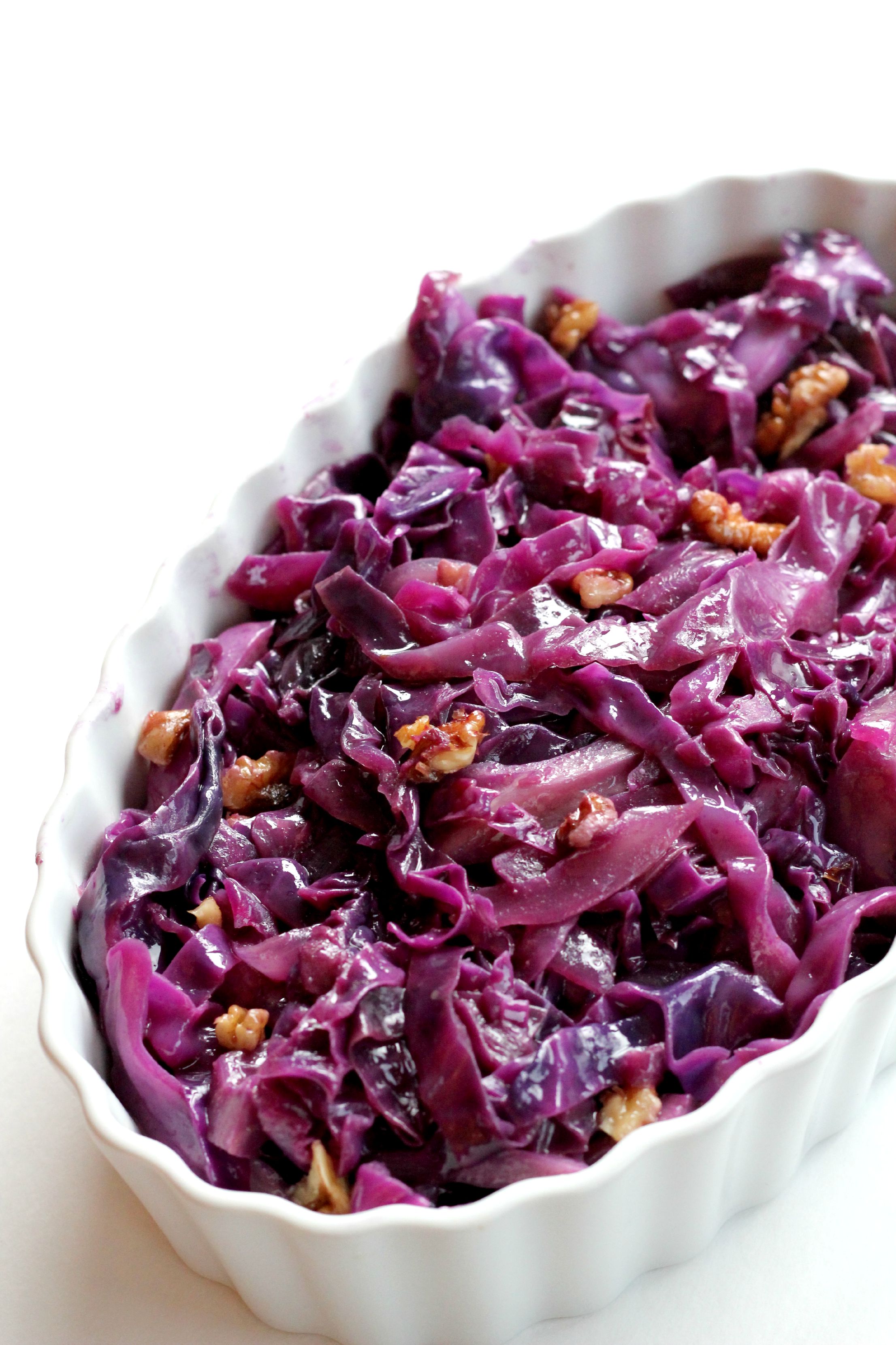 This Braised Red Cabbage with Walnuts has become my FAVORITE side dish. It goes with everything I make and it's Paleo and Vegan! 