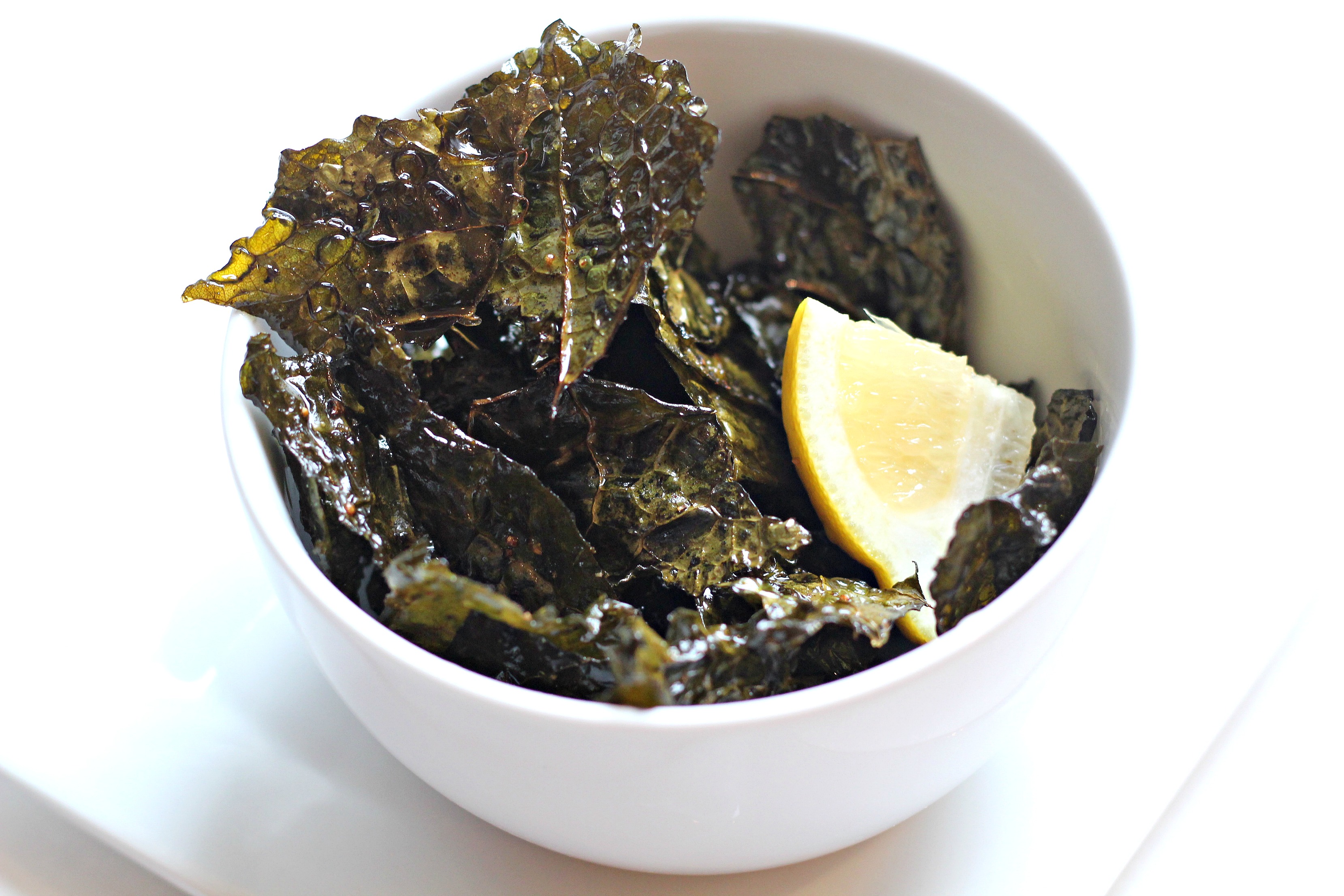 These Salt and Vinegar Kale Chips are the perfect afternoon snack! They have flavors like your favorite potato chips but the benefits of a superfood.